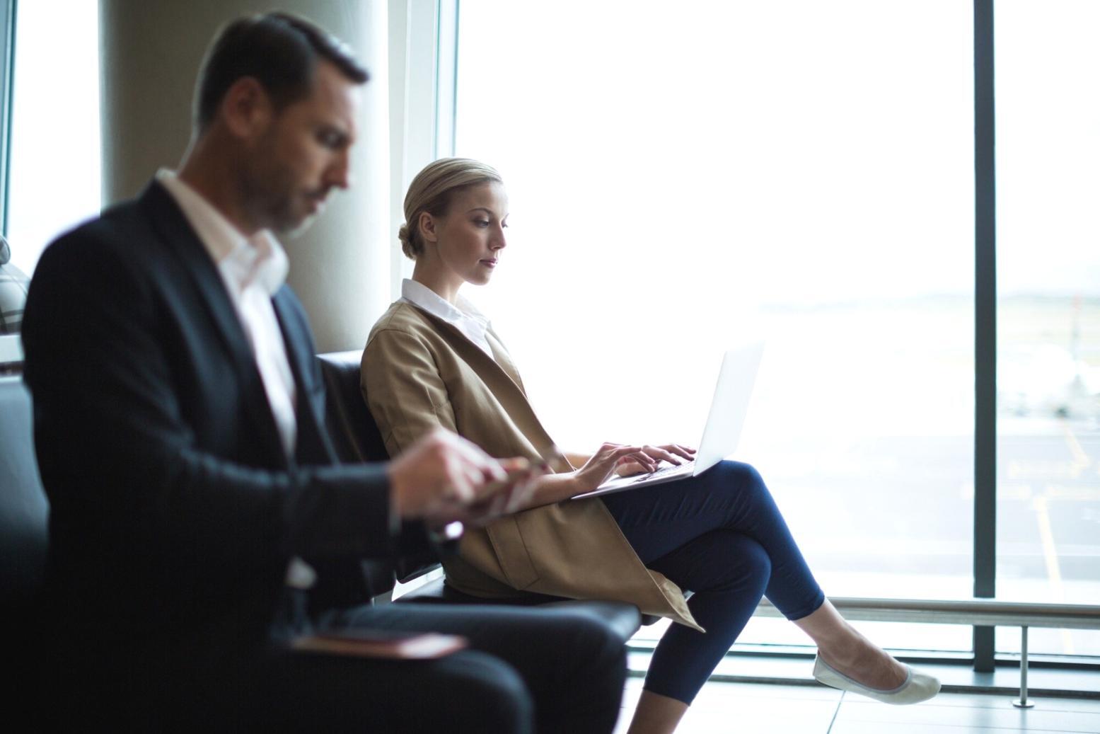 Developer analyzing typography metrics on multiple monitors showing various font rendering tests
